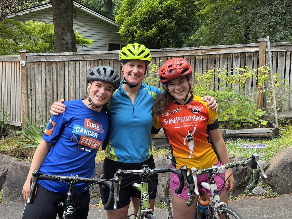 Dana Korch and her twin daughters after a charity bike ride.